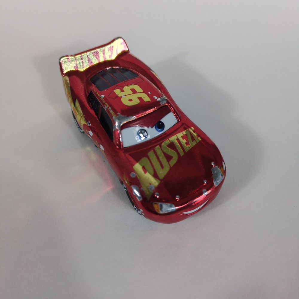 Disney Pixar Cars Lightning McQueen Rusteze Red Metallic Diecast Mattel DXV45